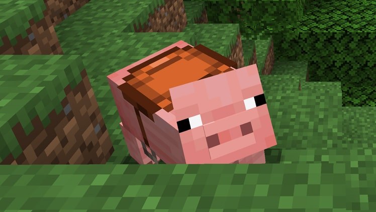A pink Minecraft pig wearing a brown leather saddle on grass