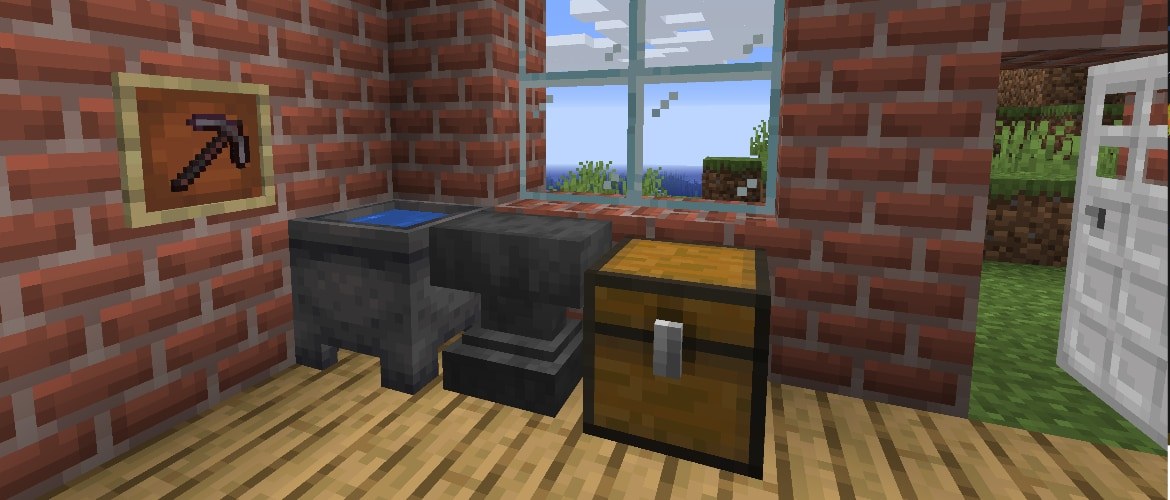 Minecraft anvil placed on a wooden floor between a cauldron and chest