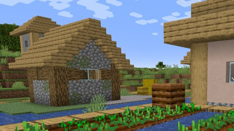Minecraft composter standing beside a village crop farm and houses