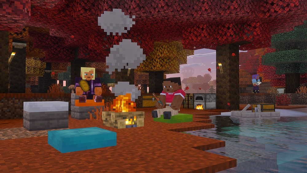 Minecraft players on cushions around a campfire under red poplar trees
