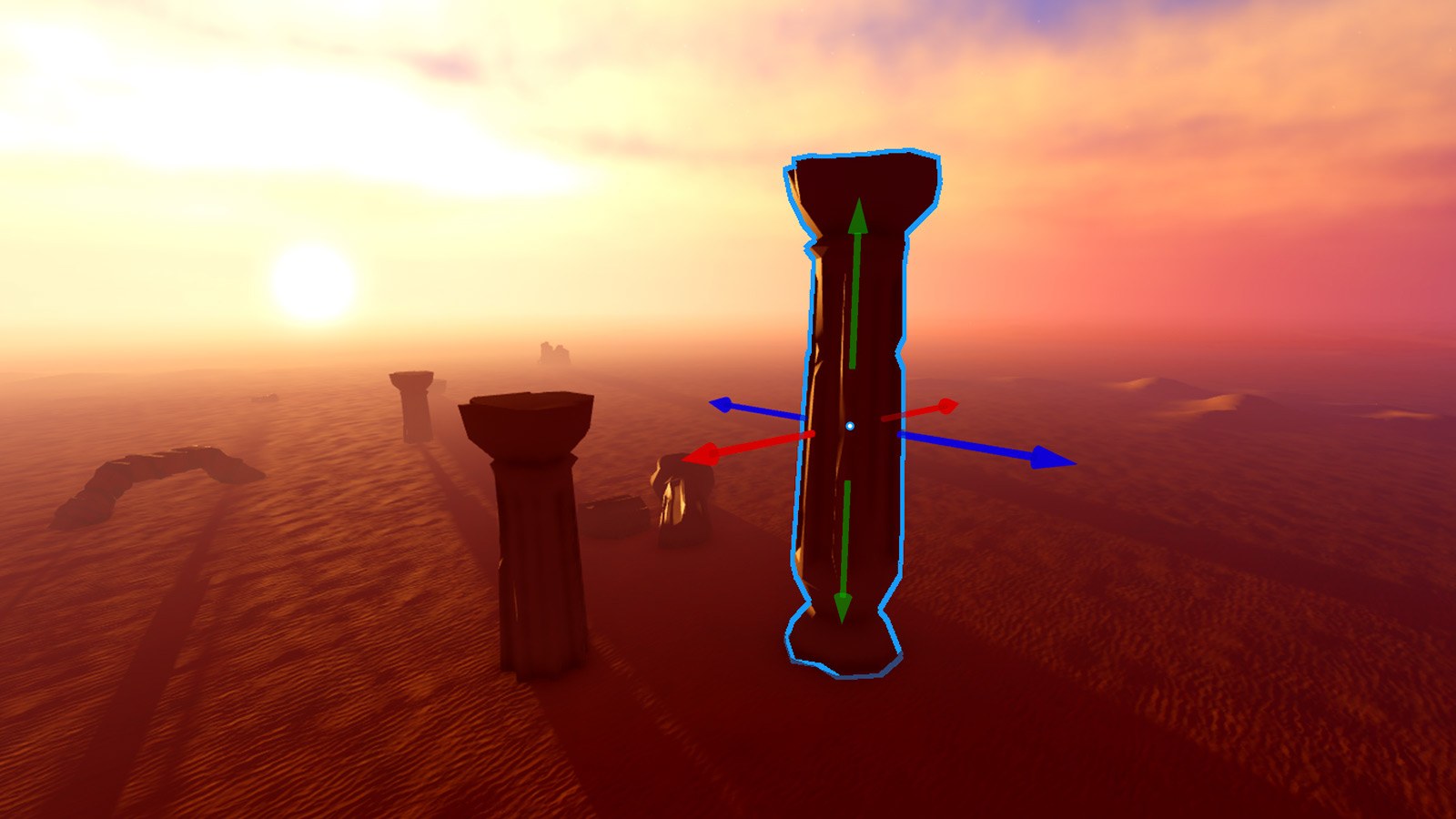 Roblox Studio 3D viewport with a desert column selected and move arrows